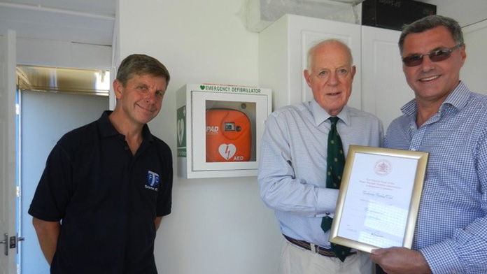 Presentation of Defibrillator by Royal Warrant Holders Association