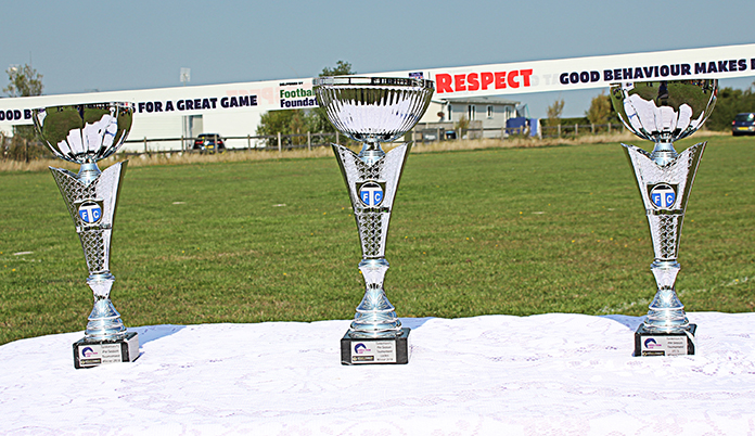 The tournament trophies sponsored by Direction Law